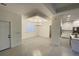 Elegant dining room with tray ceilings and contemporary chandelier at 10153 Wildcat St, Port Charlotte, FL 33981