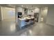 Beautiful open kitchen with stainless steel appliances and an island with bar seating at 10153 Wildcat St, Port Charlotte, FL 33981