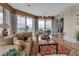 Cozy living area boasts water views, comfortable seating, and stylish decor, perfect for relaxing and entertaining at 3010 Grand Bay Blvd # 472, Longboat Key, FL 34228