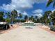 Enjoy resort-style living at this community pool with swaying palms and plenty of lounge chairs at 3010 Grand Bay Blvd # 472, Longboat Key, FL 34228