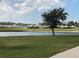 This picturesque water view is lined with yachts and boats near the golf course at 3010 Grand Bay Blvd # 472, Longboat Key, FL 34228