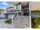 Charming two-story home with a welcoming entrance and well-maintained landscaping at 328 6Th Ave, Indian Rocks Beach, FL 33785