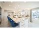 Bright, expansive kitchen featuring a large island with bar seating, and luxury finishes at 328 6Th Ave, Indian Rocks Beach, FL 33785