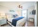 Relaxing main bedroom with a water view, comfortable bed, and coastal-themed decorations at 328 6Th Ave, Indian Rocks Beach, FL 33785