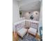 Intimate seating area near stairs with artful details and natural light at 328 6Th Ave, Indian Rocks Beach, FL 33785