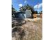 The house has a backyard with a wood privacy fence and shed at 5015 N 29Th St, Tampa, FL 33610