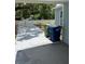 View of driveway next to side of house and garbage bins at 5015 N 29Th St, Tampa, FL 33610