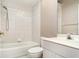 Functional bathroom with a tub and tiled backsplash features at 924 Texas St, Englewood, FL 34223