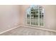 Bedroom with a scenic window offering natural light and views at 924 Texas St, Englewood, FL 34223