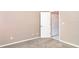 Cozy bedroom with neutral walls and carpet, adjacent closet at 924 Texas St, Englewood, FL 34223