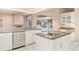 Beautiful kitchen with granite countertops and a view of the pool at 924 Texas St, Englewood, FL 34223