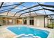 Stunning screened-in pool and patio area, ideal for entertaining and enjoying the Florida sunshine at 924 Texas St, Englewood, FL 34223