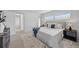 Bedroom featuring a comfortable bed, soft lighting, and modern furnishings at 3528 Casablanca Ave, St Petersburg, FL 33706