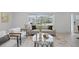 Bright and airy living room showcasing contemporary furniture and a relaxing atmosphere with ample natural light at 3528 Casablanca Ave, St Petersburg, FL 33706