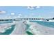 Scenic boat view of a bridge spanning clear waters on a bright, sunny day at 3528 Casablanca Ave, St Petersburg, FL 33706