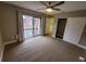 Spacious bedroom with balcony access and a closet offers ample storage space at 8114 Oak Trace Way # C, Tampa, FL 33634