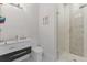 This bathroom features a glass-enclosed shower with decorative tile and modern fixtures at 17204 Bullhorn Cir, Punta Gorda, FL 33982