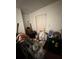 Cluttered interior space showcasing various household items and a closed door at 3613 Deleuil Ave, Tampa, FL 33610