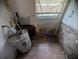 Utility room with a hot water heater and severe mold and water damage at 3613 Deleuil Ave, Tampa, FL 33610