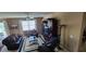 Spacious living room with comfortable seating, entertainment center, and natural light at 7620 Tangle Rush Dr, Gibsonton, FL 33534
