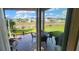 Outdoor patio featuring a table with chairs, showcasing the backyard and view at 7620 Tangle Rush Dr, Gibsonton, FL 33534