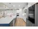 Stylish kitchen with stainless steel appliances, sleek countertops, and modern fixtures at 7163 Talamore Dr, Wesley Chapel, FL 33545