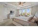 Comfortable main bedroom featuring soft carpet, a plush bed, and large windows at 7163 Talamore Dr, Wesley Chapel, FL 33545