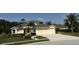 Charming single-Gathering home featuring a three-car garage and well-maintained landscaping at 10937 Bluestem Cir, Lakewood Ranch, FL 34202