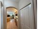 Kitchen with stainless appliances and tile flooring opens to a living room at 10937 Bluestem Cir, Lakewood Ranch, FL 34202