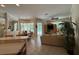 Open concept living space with views of the pool area at 10937 Bluestem Cir, Lakewood Ranch, FL 34202