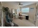 Bright office with oversized mirror, desk, and unique Zebra-striped chairs at 10937 Bluestem Cir, Lakewood Ranch, FL 34202