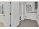 Spacious basement featuring tile flooring and white painted walls at 1764 Boca Raton Ct, Punta Gorda, FL 33950