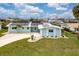 Charming single-story home featuring solar panels and a well-manicured lawn at 1764 Boca Raton Ct, Punta Gorda, FL 33950