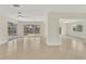 Spacious living room features tile floors, sliding glass doors, and natural light at 1764 Boca Raton Ct, Punta Gorda, FL 33950