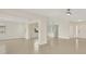 Open floor plan with tile floors, neutral walls, and lots of natural light at 1764 Boca Raton Ct, Punta Gorda, FL 33950