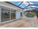View of pool and patio area featuring an enclosure and beautiful views of the canal at 1764 Boca Raton Ct, Punta Gorda, FL 33950