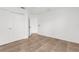 Bedroom with tile floors, a ceiling fan, and a closet at 2421 Valkaria Ave, North Port, FL 34286