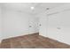 The bedroom includes tile flooring and a ceiling fan at 2421 Valkaria Ave, North Port, FL 34286