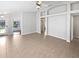 Spacious living room with neutral paint, tile floors, archways and an open floor plan at 2936 Banyan Hill Ln, Land O Lakes, FL 34639