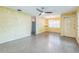 Open floor plan, terrazzo floors, and eat-in kitchen offer great flow at 5101 Town N Country Blvd, Tampa, FL 33615