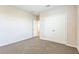 Bedroom features neutral paint, carpet flooring, and a large closet at 5254 Suncatcher Dr, Wesley Chapel, FL 33545