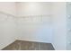 Walk-in closet with neutral walls, carpeted floor and wire rack shelving at 5254 Suncatcher Dr, Wesley Chapel, FL 33545