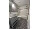 Beautiful bathroom with patterned tile floor, modern vanity, and bathtub at 7310 Sunshine Skyway S Ln # 116, St Petersburg, FL 33711
