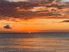 Scenic sunset view over calm ocean waters, with colorful clouds reflecting the warm light at 7310 Sunshine Skyway S Ln # 116, St Petersburg, FL 33711