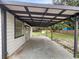 View of the covered back porch and the backyard at 103 4Th Nw Ave, Lutz, FL 33548