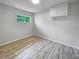 Clean bedroom highlighting neutral tones, and natural light at 103 4Th Nw Ave, Lutz, FL 33548