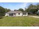 Charming single-story home with a covered front porch and carport at 103 4Th Nw Ave, Lutz, FL 33548