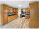 Large kitchen with wooden cabinets, stainless steel appliances, and generous counter space at 103 4Th Nw Ave, Lutz, FL 33548