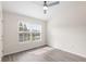 Bright, airy bedroom with neutral paint and large window at 11622 Colony Lake Dr, Tampa, FL 33635