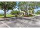 Community area with covered pavilion and parking at 11622 Colony Lake Dr, Tampa, FL 33635